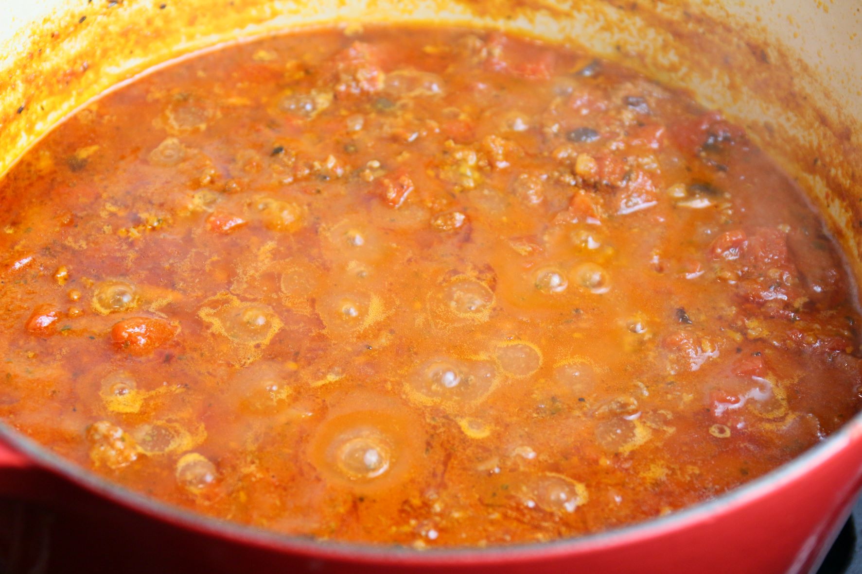 Bubbling pot of Bolognese Sauce